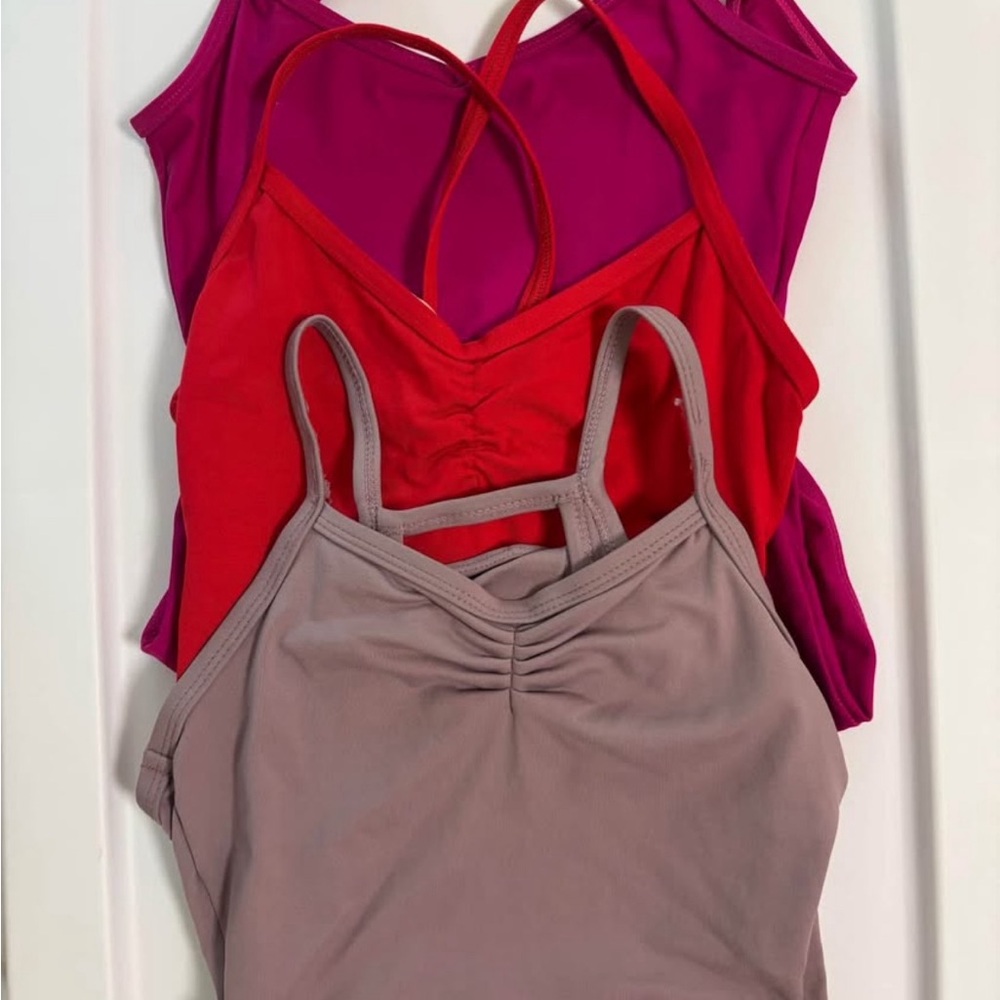 Lot of Ballet leotards and tights
